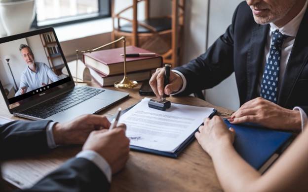 Notarizing divorce paperwork during a Zoom mediation session
